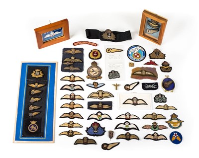 Lot 609 - Cloth badges.