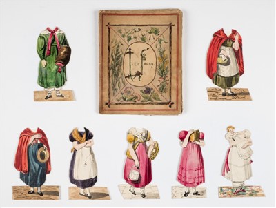 Lot 465 - Manuscript paper doll book.