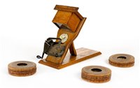 Lot 186 - Kinora of London flicker book viewer.