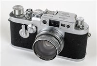 Lot 387 - Leica IIIg chrome rangefinder with Summitar 50mm f/2 lens.