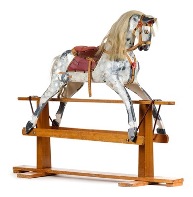 Lot 522 - Rocking Horse. An English dapple grey rocking horse by J. Collinson and Sons, circa 1950s