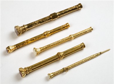 Lot 12 - Gold Pencils. A collection of 5 Victorian yellow metal propelling pencils