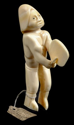 Lot 114 - Inuit. An Inuit carved sperm whale tooth by Johannes Kreutzmann (1862-1940)