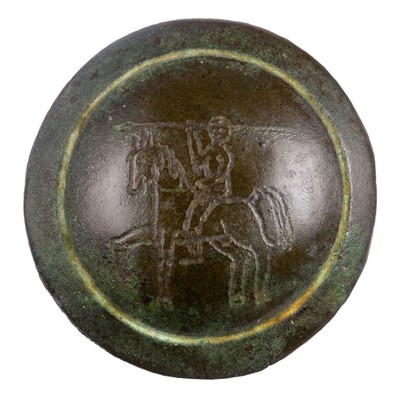 Lot 126 - Romano-Celtic. A Romano-Celtic bronze roundel approximately 200-300AD