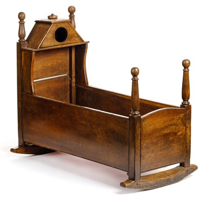 Lot 134 - Crib. An 19th century Welsh oak rocking crib