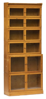 Lot 297 - Bookcase. A 1920s light oak 5-tier book case