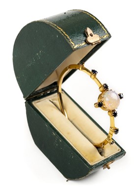 Lot 2 - Bangle. An opal and sapphire bangle