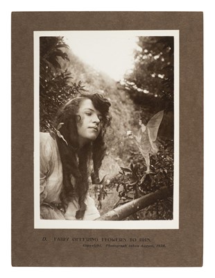 Lot 239 - Cottingley Fairies. Fairy offering flowers to Iris, 1920