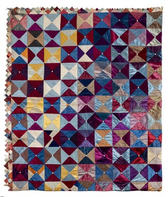 Lot 183 - Quilt. A silk patchwork quilt, English, early 20th century