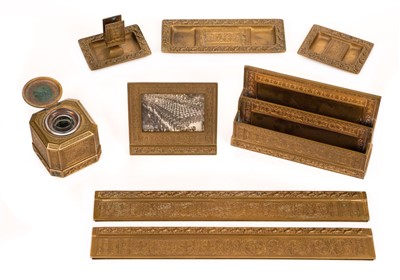 Lot 67 - Tiffany, New York. A Tiffany "Venetian" pattern brass desk set circa 1910