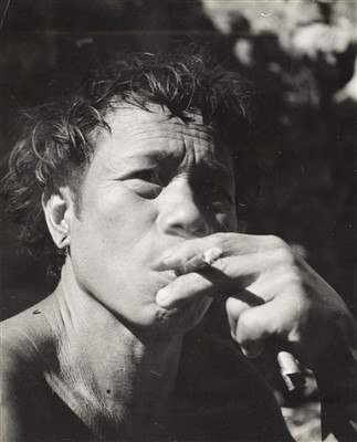 Lot 167 - Philippines. Close-up head portrait of a smoking Filipino, by Pierre Verger, c. 1940