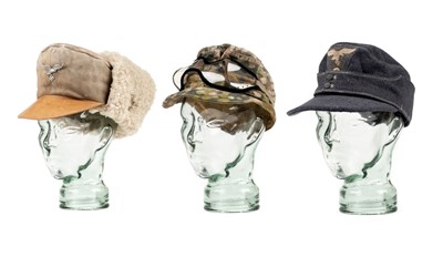 Lot 206 - WWII German hats. A Luftwaffe M43 cap and goggles