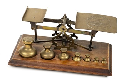 Lot 63 - Postal scales. A good set of Victorian brass postal scales