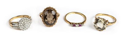 Lot 29 - Rings. A yellow metal diamond cluster ring plus 3 other rings