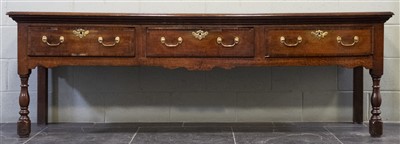 Lot 129 - Dresser base. A good George III period oak dresser base