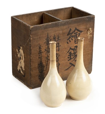 Lot 103 - Vases. A pair of Chinese pottery bottle vases probably late 19th century