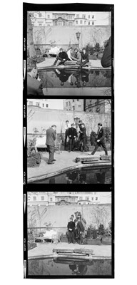 Lot 90 - The Beatles: A Hard Day's Night. The Beatles in the walled garden of Les Ambassadeurs club