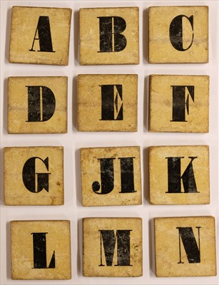 Lot 536 - Alphabet. A set of pictorial alphabet tiles, c. 1830s