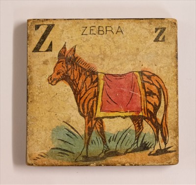 Lot 536 - Alphabet. A set of pictorial alphabet tiles, c. 1830s