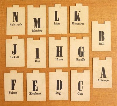 Lot 536 - Alphabet. A set of pictorial alphabet tiles, c. 1830s