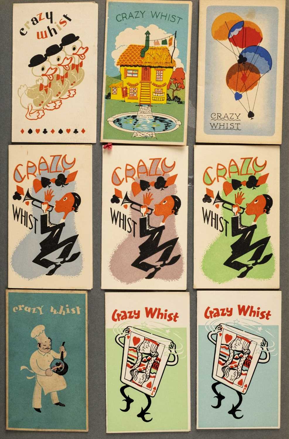 Lot 544 - Playing cards. An album of whist and bridge score cards, early-later 20th century