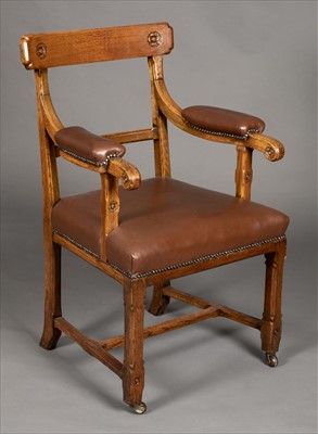 Lot 121 - Chair. A Victorian Gothic carved oak chair in the manner of Pugin