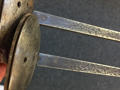 Lot 11 - Swords. A collection of fencing foils