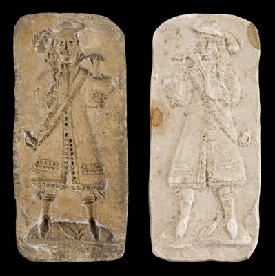 Lot 134 - Mould. An 18th century plaster mould of a piper, probably ginger bread or butter
