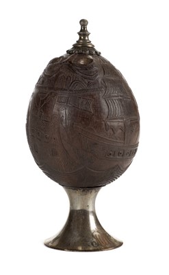 Lot 97 - Coconut bugbear. A George III period carved bugbear with plated mounts