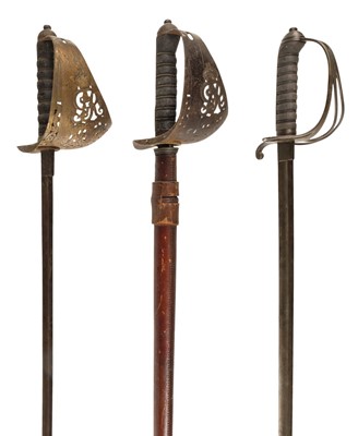 Lot 13 - Swords. An 1822 pattern cavalry officer's sword plus two others