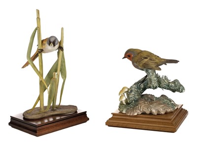 Lot 319 - Royal Worcester. A model of a Robin plus Bearded Reedling