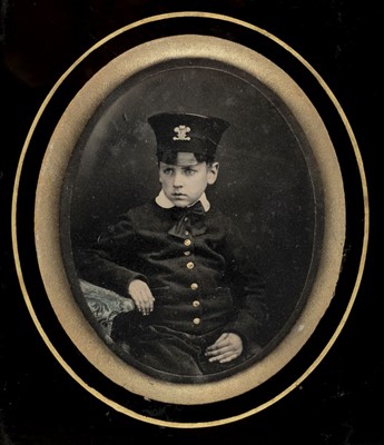 Lot 165 - Quarter-plate ambrotype of a young boy in uniform, late 1850s