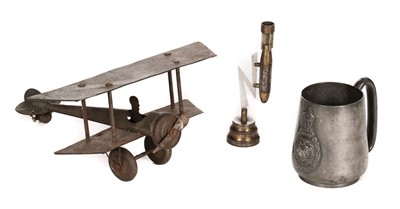 Lot 110 - Tinplate Biplane. A toy model biplane c.1910