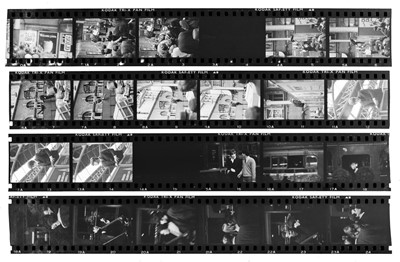Lot 99 - The Beatles: A Hard Day's Night. The Beatles and film crew at Marylebone station, London