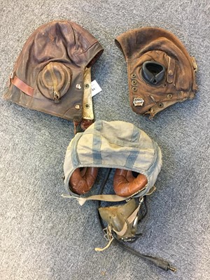 Lot 44 - Flying Helmets. A WWII B Type flying helmet and others