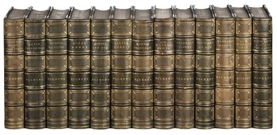 Lot 342 - Dickens (Charles). Works, 18 works bound in 13 volumes, Chapman & Hall, circa 1880