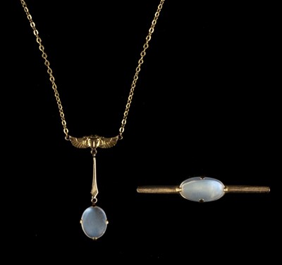 Lot 79 - Jewellery Suite. Egyptian Revival gold and moonstone suite