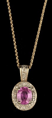 Lot 87 - Pendant. A pink sapphire and diamond pendant