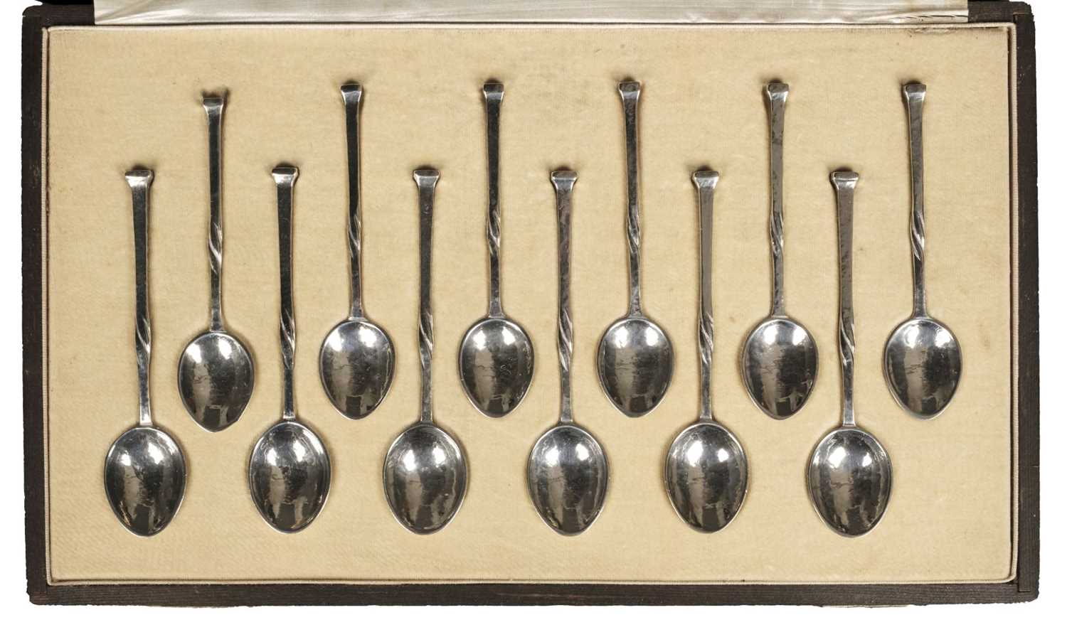 Lot 38 - Omar Ramsden. Cased silver tea and coffee spoons