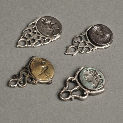 Lot 28 - Fobs. George III silver swivel fobs