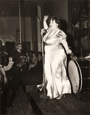 Lot 99 - Weegee (a.k.a. Arthur Fellig, 1899-1968). At Sammy's in the Bowery, 1944