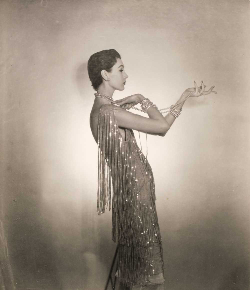 Lot 6 - Beaton (Cecil, 1904-1980). Dovima wearing Chanel, February 1953