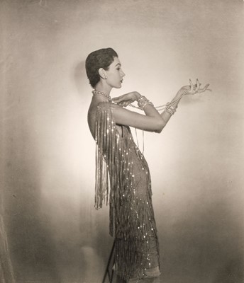 Lot 6 - Beaton (Cecil, 1904-1980). Dovima wearing Chanel, February 1953