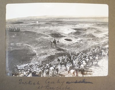 Lot 68 - Middle East. A small complete album of 24 window-mounted photographs, by G. R. Hughes