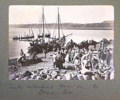 Lot 68 - Middle East. A small complete album of 24 window-mounted photographs, by G. R. Hughes