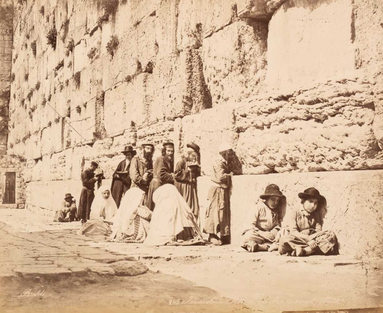 Lot 69 - Middle East. An album containing 52 mounted photographic views, circa 1880s