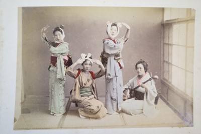 Lot 64 - Japan. A concertina album of 50 colour tinted albumen prints