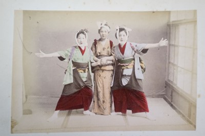 Lot 64 - Japan. A concertina album of 50 colour tinted albumen prints