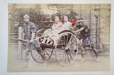 Lot 64 - Japan. A concertina album of 50 colour tinted albumen prints