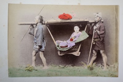 Lot 64 - Japan. A concertina album of 50 colour tinted albumen prints